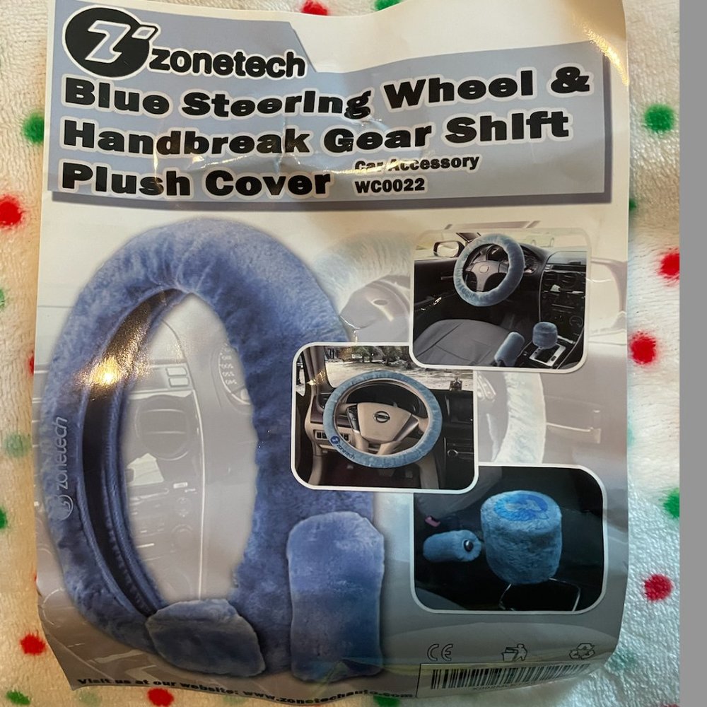 Blue fuzzy steering wheel cover